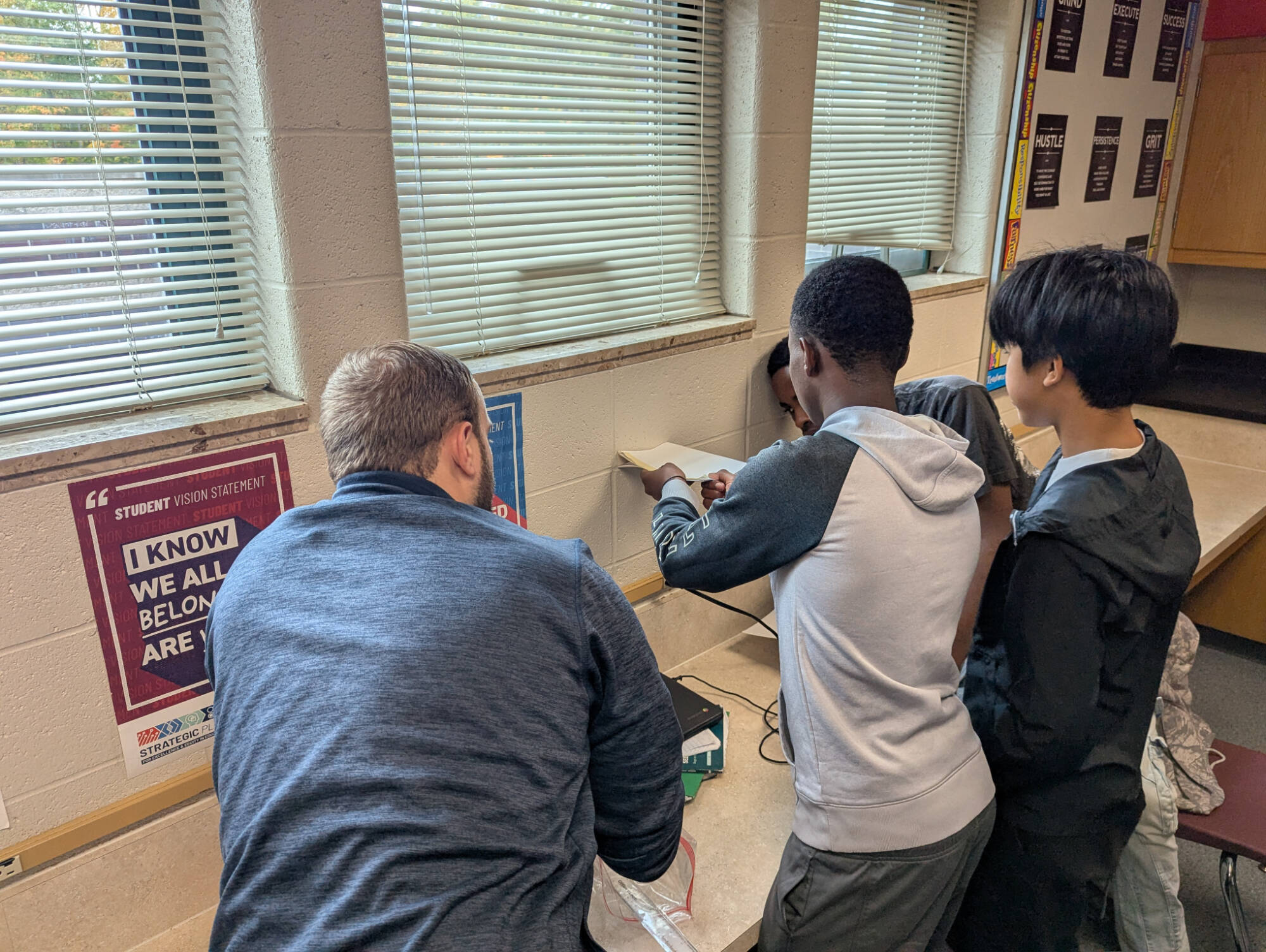 Students participating in an engineering design activity